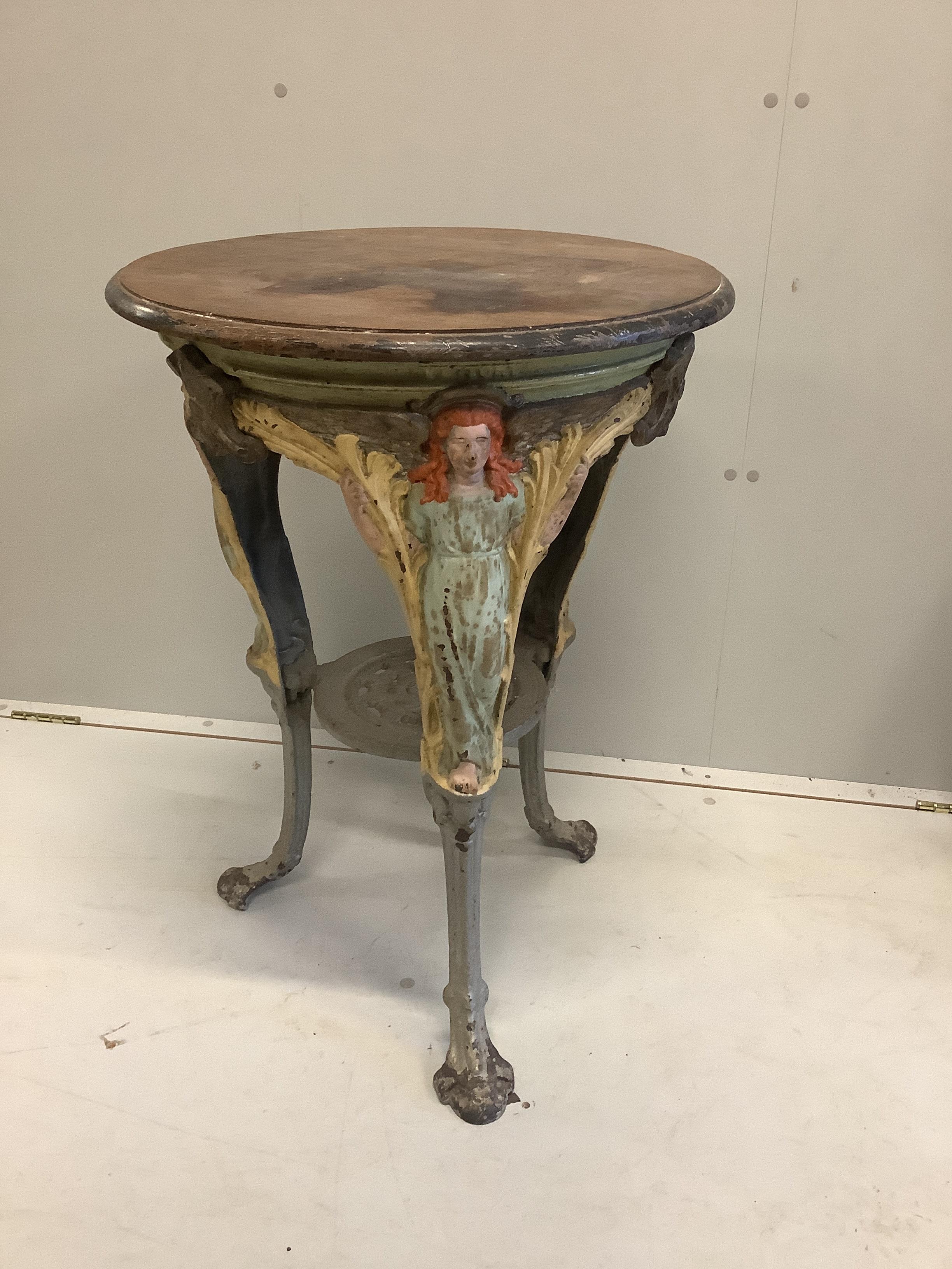 A Victorian circular painted cast iron pub table, diameter 55cm, height 76cm